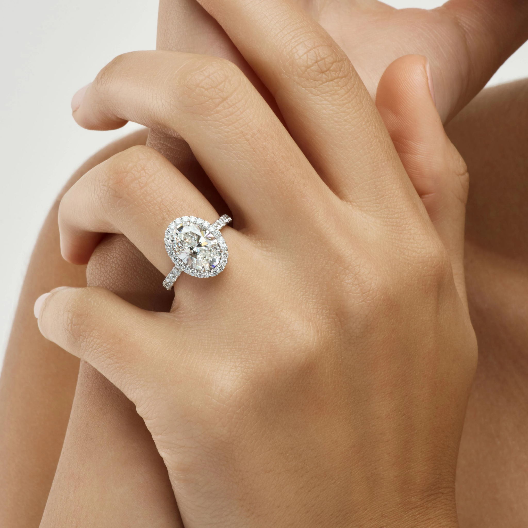 OVAL CUT PAVÉ DIAMOND RING
