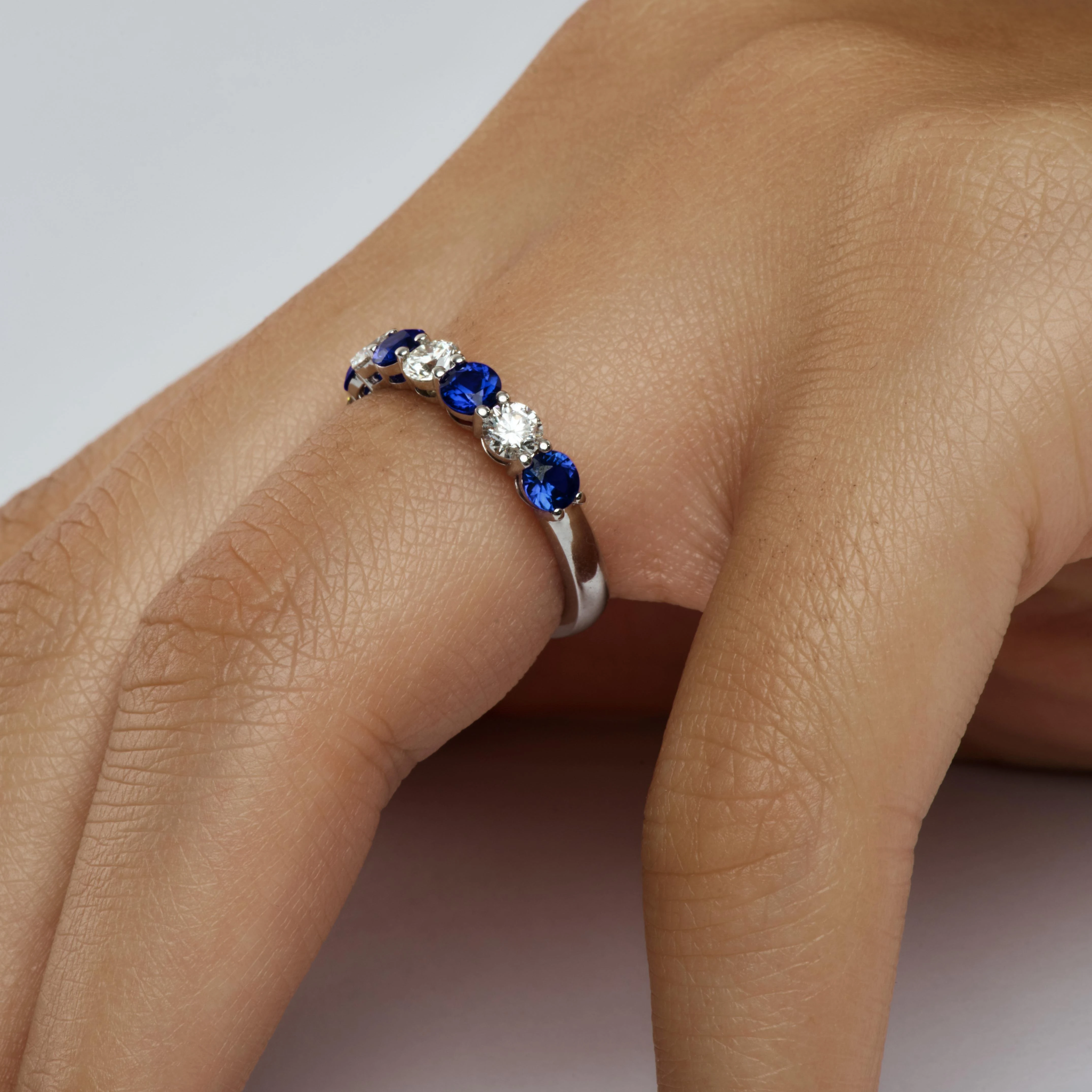 ROUND CUT SAPPHIRE AND DIAMOND RING